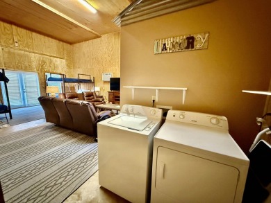 Charming cabin in the heart of Pickwick!  Minutes to golf course on Shiloh Falls Golf Club in Tennessee - for sale on GolfHomes.com, golf home, golf lot