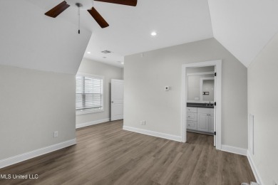 Do not miss this Beautiful white brick home with wonderful on Lake Caroline Golf Club in Mississippi - for sale on GolfHomes.com, golf home, golf lot