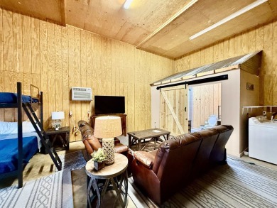 Charming cabin in the heart of Pickwick!  Minutes to golf course on Shiloh Falls Golf Club in Tennessee - for sale on GolfHomes.com, golf home, golf lot
