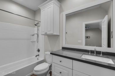 Do not miss this Beautiful white brick home with wonderful on Lake Caroline Golf Club in Mississippi - for sale on GolfHomes.com, golf home, golf lot