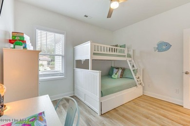 Coastal charm and a fantastic location come together in this on Oak Island Golf Club in North Carolina - for sale on GolfHomes.com, golf home, golf lot