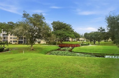 Rent from day 1. Updated 2-bedroom, 2-bath residence featuring a on Pine Island Ridge Country Club in Florida - for sale on GolfHomes.com, golf home, golf lot