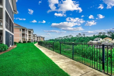Location! Location! Location! This first-floor, end-unit condo on River Oaks Golf Plantation  in South Carolina - for sale on GolfHomes.com, golf home, golf lot