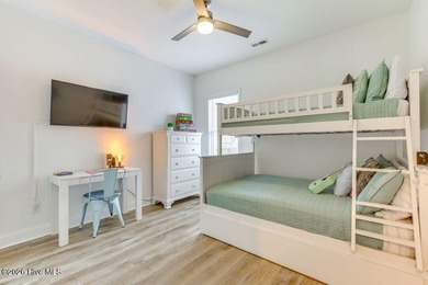 Coastal charm and a fantastic location come together in this on Oak Island Golf Club in North Carolina - for sale on GolfHomes.com, golf home, golf lot