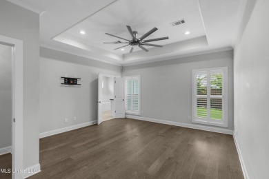 Do not miss this Beautiful white brick home with wonderful on Lake Caroline Golf Club in Mississippi - for sale on GolfHomes.com, golf home, golf lot