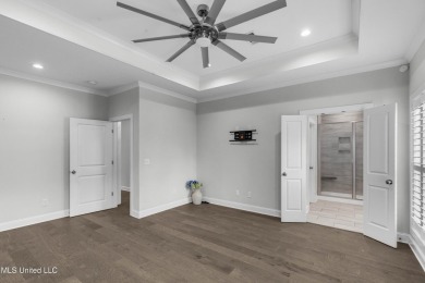 Do not miss this Beautiful white brick home with wonderful on Lake Caroline Golf Club in Mississippi - for sale on GolfHomes.com, golf home, golf lot