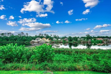 Location! Location! Location! This first-floor, end-unit condo on River Oaks Golf Plantation  in South Carolina - for sale on GolfHomes.com, golf home, golf lot