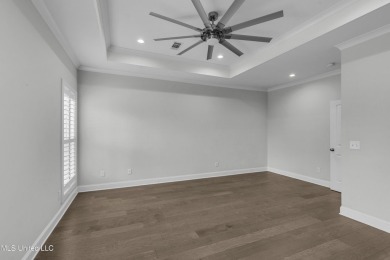 Do not miss this Beautiful white brick home with wonderful on Lake Caroline Golf Club in Mississippi - for sale on GolfHomes.com, golf home, golf lot