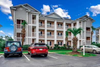 Location! Location! Location! This first-floor, end-unit condo on River Oaks Golf Plantation  in South Carolina - for sale on GolfHomes.com, golf home, golf lot