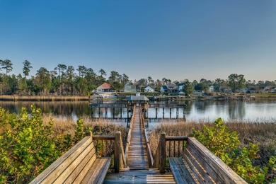 Location! Location! Location! This first-floor, end-unit condo on River Oaks Golf Plantation  in South Carolina - for sale on GolfHomes.com, golf home, golf lot