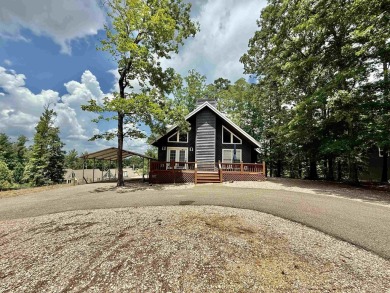 Charming cabin in the heart of Pickwick!  Minutes to golf course on Shiloh Falls Golf Club in Tennessee - for sale on GolfHomes.com, golf home, golf lot
