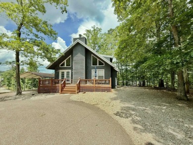 Charming cabin in the heart of Pickwick!  Minutes to golf course on Shiloh Falls Golf Club in Tennessee - for sale on GolfHomes.com, golf home, golf lot