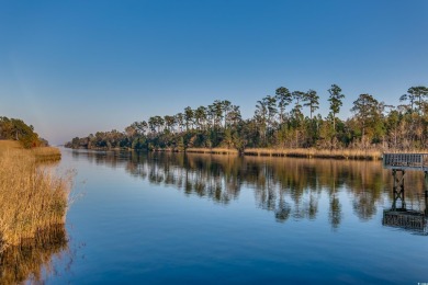 Location! Location! Location! This first-floor, end-unit condo on River Oaks Golf Plantation  in South Carolina - for sale on GolfHomes.com, golf home, golf lot