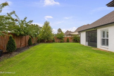 Do not miss this Beautiful white brick home with wonderful on Lake Caroline Golf Club in Mississippi - for sale on GolfHomes.com, golf home, golf lot