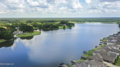 Do not miss this Beautiful white brick home with wonderful on Lake Caroline Golf Club in Mississippi - for sale on GolfHomes.com, golf home, golf lot