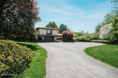 This Frank Lloyd Wright inspired home near Bucknell University on Bucknell Golf Club in Pennsylvania - for sale on GolfHomes.com, golf home, golf lot