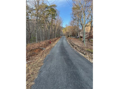 This 1.7 acre lot is located near the back gate of Bent Tree, a on Bent Tree Golf Course in Georgia - for sale on GolfHomes.com, golf home, golf lot