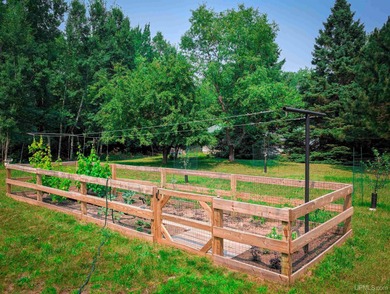 Welcome to 201 Cedar Ln., a charming ranch-style home perfectly on Gentzs Homestead Golf Course in Michigan - for sale on GolfHomes.com, golf home, golf lot