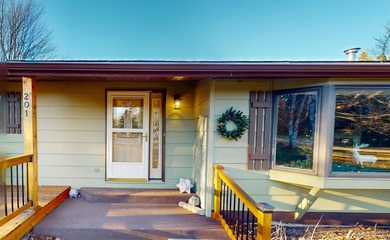 Welcome to 201 Cedar Ln., a charming ranch-style home perfectly on Gentzs Homestead Golf Course in Michigan - for sale on GolfHomes.com, golf home, golf lot