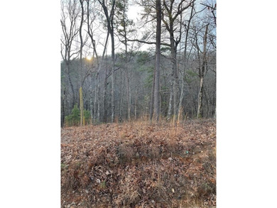 This 1.7 acre lot is located near the back gate of Bent Tree, a on Bent Tree Golf Course in Georgia - for sale on GolfHomes.com, golf home, golf lot