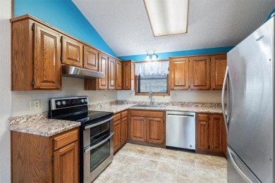 Want to live on ISLAND time? This well cared for and recently on Holiday Island Executive Golf Course in Arkansas - for sale on GolfHomes.com, golf home, golf lot