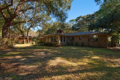 UPDATED GOLF COURSE HOME WITH BONUS BUILDING! This isn't your on Rocky Bayou Country Club in Florida - for sale on GolfHomes.com, golf home, golf lot