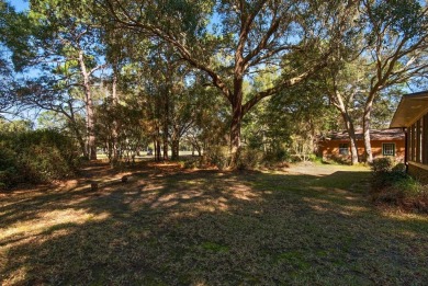 UPDATED GOLF COURSE HOME WITH BONUS BUILDING! This isn't your on Rocky Bayou Country Club in Florida - for sale on GolfHomes.com, golf home, golf lot