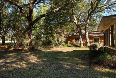 UPDATED GOLF COURSE HOME WITH BONUS BUILDING! This isn't your on Rocky Bayou Country Club in Florida - for sale on GolfHomes.com, golf home, golf lot