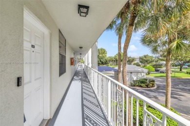 If you are looking for a condo with a view, look no further on Pine Island Ridge Country Club in Florida - for sale on GolfHomes.com, golf home, golf lot