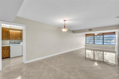 If you are looking for a condo with a view, look no further on Pine Island Ridge Country Club in Florida - for sale on GolfHomes.com, golf home, golf lot