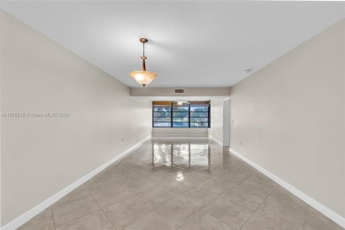 If you are looking for a condo with a view, look no further on Pine Island Ridge Country Club in Florida - for sale on GolfHomes.com, golf home, golf lot