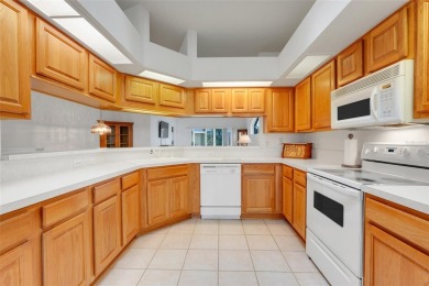 This beautifully maintained 2-bedroom, 2-bath, with den or 3rd on Monarch At Royal Highlands in Florida - for sale on GolfHomes.com, golf home, golf lot