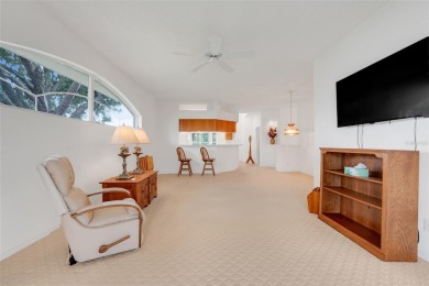 This beautifully maintained 2-bedroom, 2-bath, with den or 3rd on Monarch At Royal Highlands in Florida - for sale on GolfHomes.com, golf home, golf lot