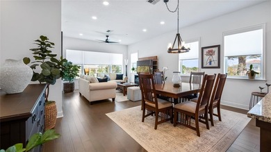 Discover exclusive living in this luxury townhome nestled within on Eagle Creek Golf Club in Florida - for sale on GolfHomes.com, golf home, golf lot