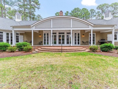 Overlooking the 7th green of Pinewild's Magnolia Course, this on Pinewild Country Club of Pinehurst in North Carolina - for sale on GolfHomes.com, golf home, golf lot