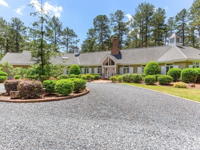 Overlooking the 7th green of Pinewild's Magnolia Course, this on Pinewild Country Club of Pinehurst in North Carolina - for sale on GolfHomes.com, golf home, golf lot