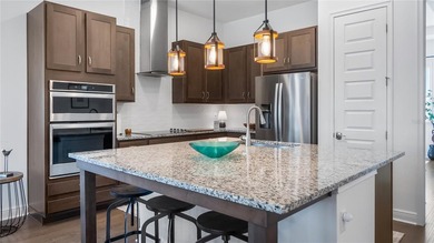 Discover exclusive living in this luxury townhome nestled within on Eagle Creek Golf Club in Florida - for sale on GolfHomes.com, golf home, golf lot