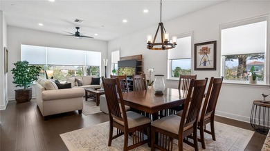 Discover exclusive living in this luxury townhome nestled within on Eagle Creek Golf Club in Florida - for sale on GolfHomes.com, golf home, golf lot