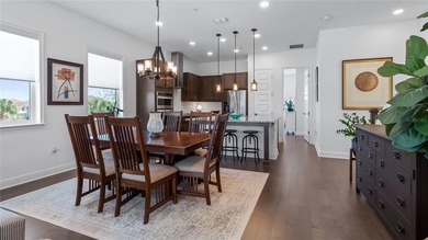 Discover exclusive living in this luxury townhome nestled within on Eagle Creek Golf Club in Florida - for sale on GolfHomes.com, golf home, golf lot