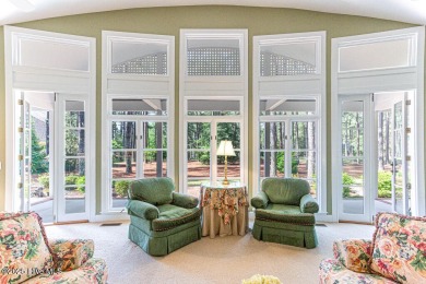 Overlooking the 7th green of Pinewild's Magnolia Course, this on Pinewild Country Club of Pinehurst in North Carolina - for sale on GolfHomes.com, golf home, golf lot