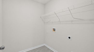 Welcome to 2228 Warbler Drive at Horton Park, located in Apex on Knights Play Golf Center in North Carolina - for sale on GolfHomes.com, golf home, golf lot