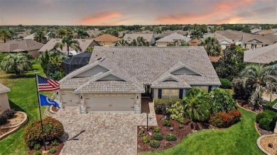 MAGNIFICENT 3/2 Whispering Pine with STUNNING HEATED POOL and on The Links of Spruce Creek in Florida - for sale on GolfHomes.com, golf home, golf lot