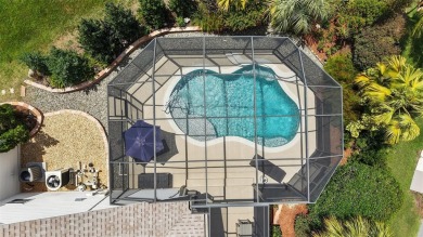 MAGNIFICENT 3/2 Whispering Pine with STUNNING HEATED POOL and on The Links of Spruce Creek in Florida - for sale on GolfHomes.com, golf home, golf lot