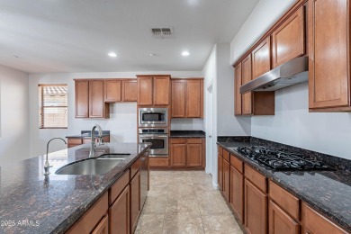 Experience resort-style living in this stunning 5-bedroom, 4 on Blackstone Country Club in Arizona - for sale on GolfHomes.com, golf home, golf lot