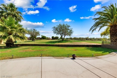 Nestled between the majestic backdrop of golf course greens and on Mojave Resort Golf Club in Nevada - for sale on GolfHomes.com, golf home, golf lot