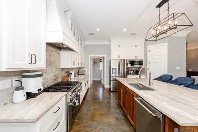 Welcome Home! Situated on a corner lot in the Prestigious Carter on Carter Plantation Golf Course in Louisiana - for sale on GolfHomes.com, golf home, golf lot