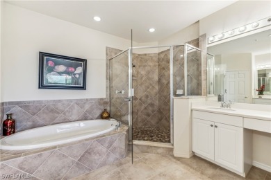 PRICE REDUCTION! LOOKING FOR A SPACIOUS CONDO WITH A GARAGE? YOU on River Hall Country Club in Florida - for sale on GolfHomes.com, golf home, golf lot