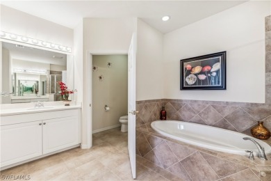 PRICE REDUCTION! LOOKING FOR A SPACIOUS CONDO WITH A GARAGE? YOU on River Hall Country Club in Florida - for sale on GolfHomes.com, golf home, golf lot