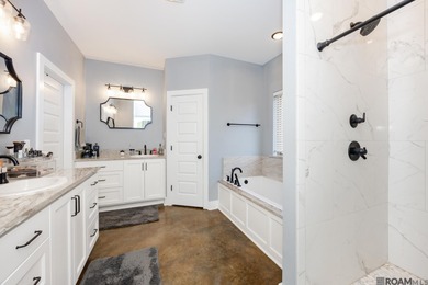 Welcome Home! Situated on a corner lot in the Prestigious Carter on Carter Plantation Golf Course in Louisiana - for sale on GolfHomes.com, golf home, golf lot