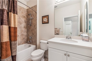 PRICE REDUCTION! LOOKING FOR A SPACIOUS CONDO WITH A GARAGE? YOU on River Hall Country Club in Florida - for sale on GolfHomes.com, golf home, golf lot